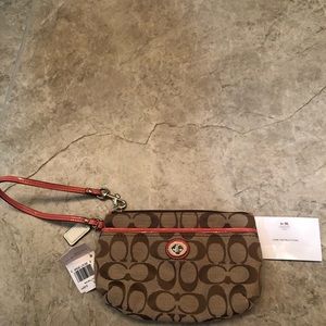 COACH CORAL WRISTLET